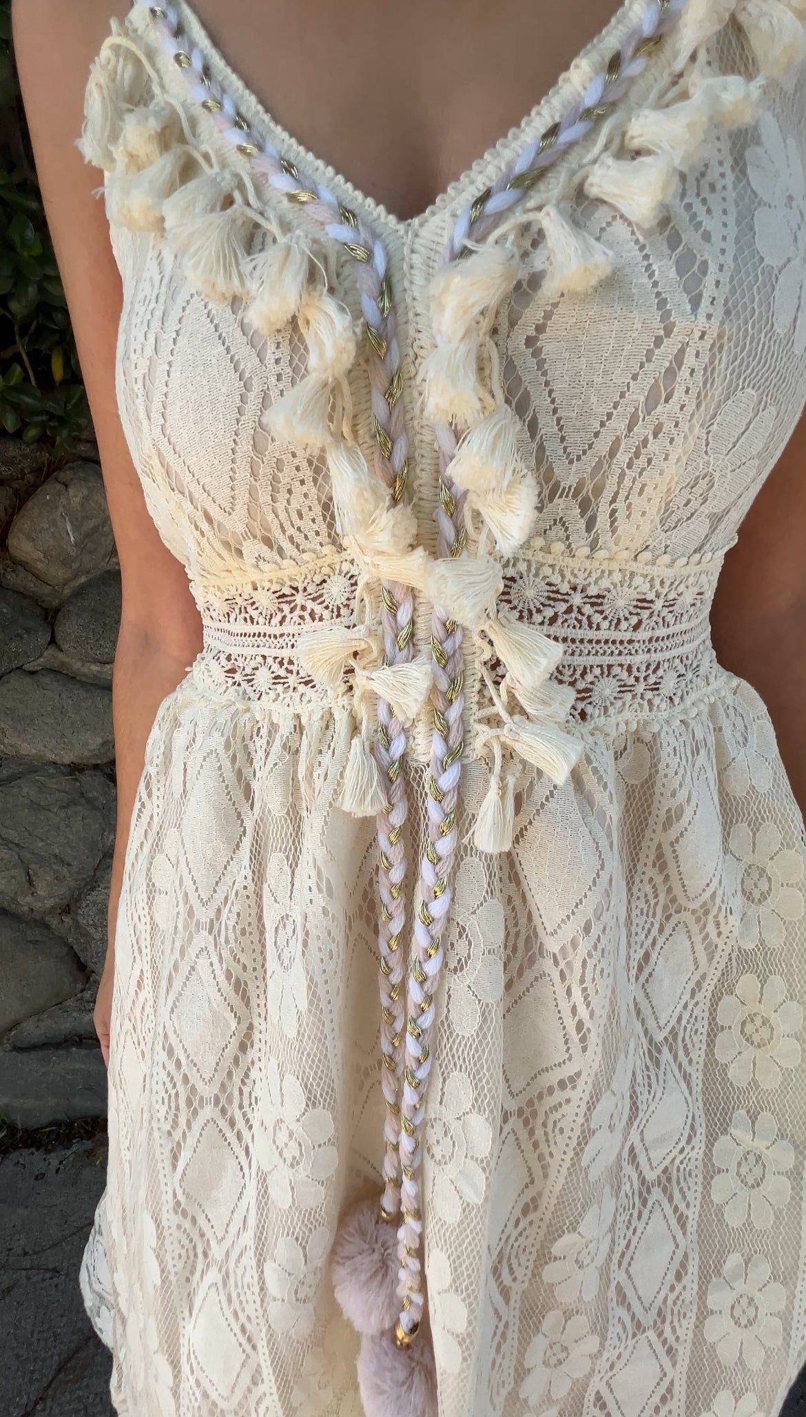 Bust detail of the tassels