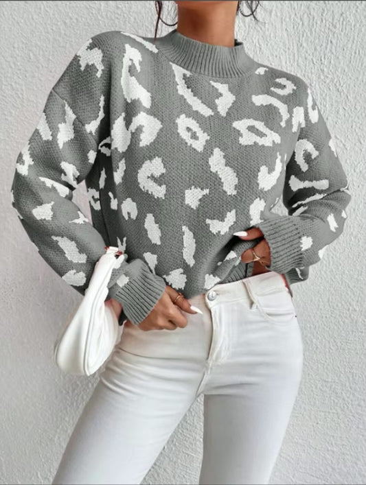 Woman in Gray Leopard Print Loose Fit Pullover Sweater facing forward up close