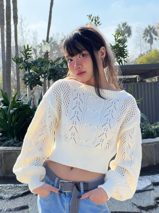 Woman in Neutral Beige Cropped Knit Top facing forward up close