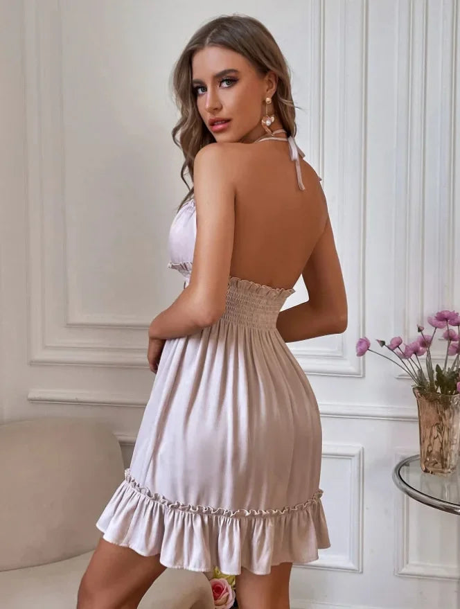 Woman in Ruffle Trim Spaghetti Strap Mini Dress in White facing backwards up close